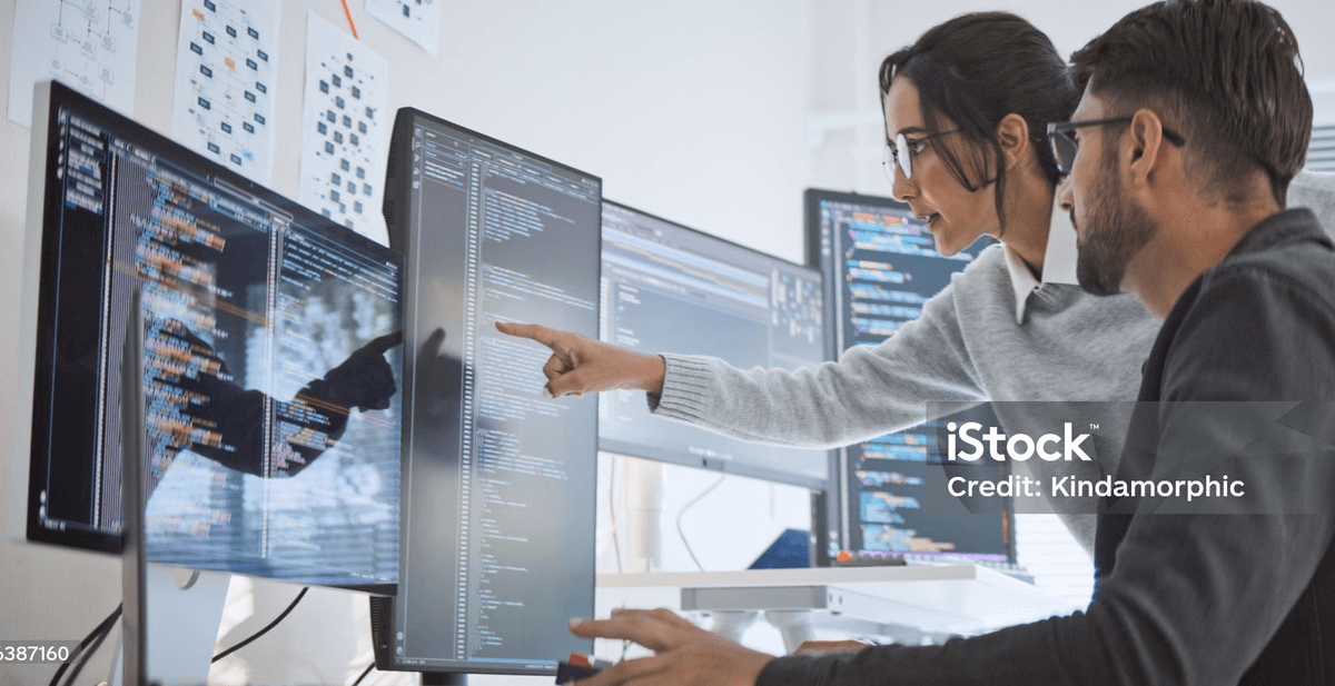 Team working with data on screens